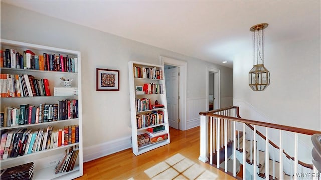 80 Lake St, Urbana, NY 14840 - hall with wood finished floors and an upstairs landing