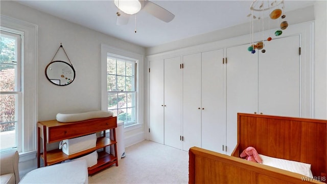 80 Lake St, Urbana, NY 14840 - bedroom featuring light colored carpet and a ceiling fan