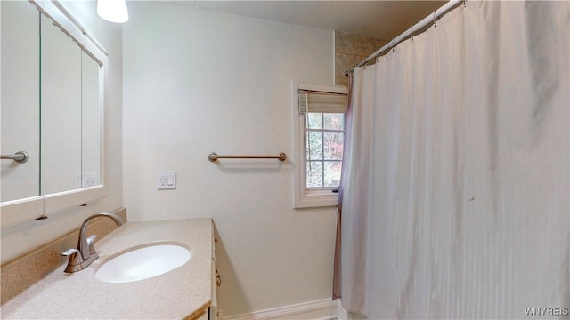 80 Lake St, Urbana, NY 14840 - bathroom featuring vanity and curtained shower