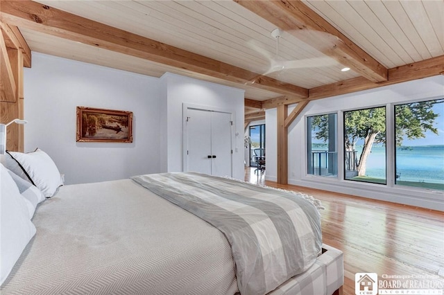 6007 Tinkertown Dr, Chautauqua, NY 14728 - bedroom featuring beamed ceiling, multiple windows, and light wood finished floors