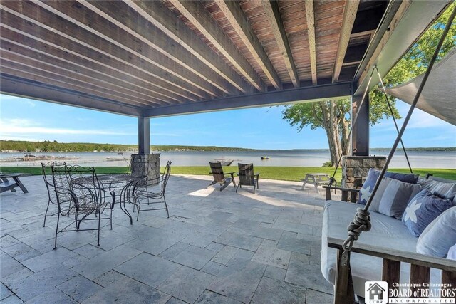 6007 Tinkertown Dr, Chautauqua, NY 14728 - view of patio / terrace with a water view
