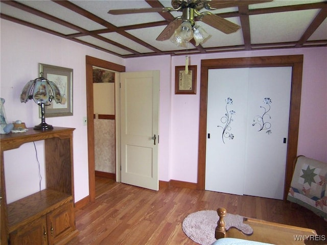 8330 Greiner Rd, Clarence, NY 14221 - interior space featuring light wood-type flooring, coffered ceiling, and baseboards