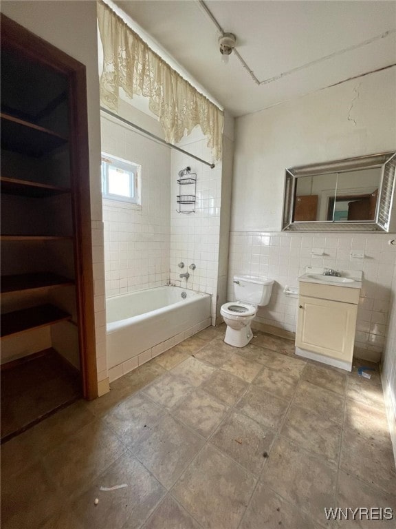 500 Massachusetts Ave, Buffalo, NY 14213 - full bathroom with tile walls, vanity, toilet, bathtub / shower combination, and tile patterned floors