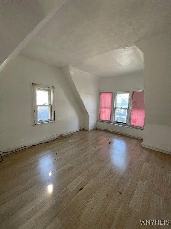 500 Massachusetts Ave, Buffalo, NY 14213 - bonus room featuring wood finished floors, a textured ceiling, baseboard heating, and baseboards