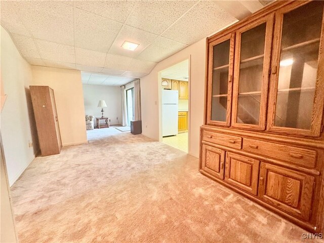 111 Spyglass Ln, Manlius, NY 13066 - unfurnished room featuring light carpet and a drop ceiling