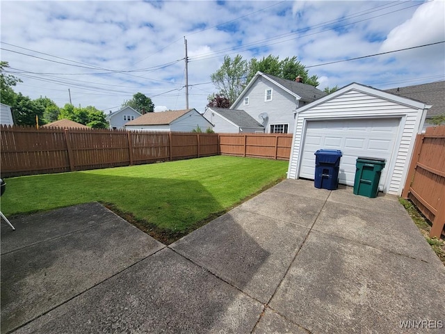 139 Englewood Ave, Buffalo, NY 14214 - view of yard with a patio, a detached garage, driveway, and an outbuilding