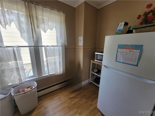 139 Englewood Ave, Buffalo, NY 14214 - corridor featuring a baseboard radiator, plenty of natural light, ornamental molding, and wood finished floors
