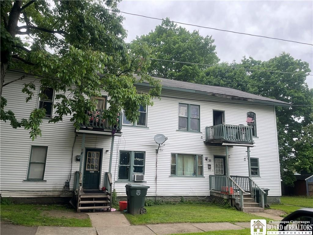 20-22 Jeffords St, Jamestown, NY 14701 - view of front of property featuring a balcony, a front yard, and cooling unit