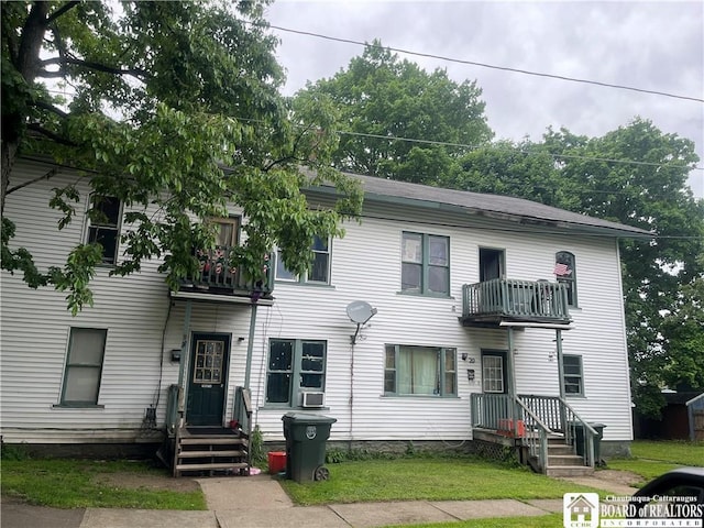 20-22 Jeffords St, Jamestown, NY 14701 - view of front of property featuring a balcony, a front yard, and cooling unit