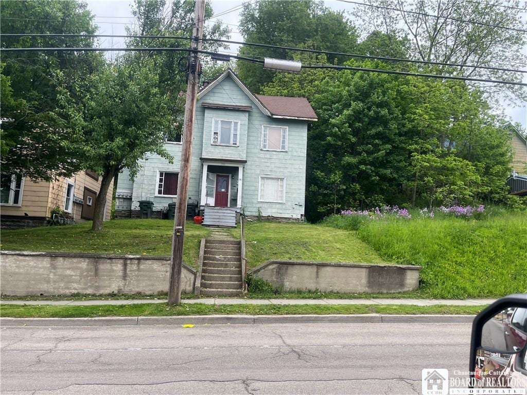 741 E 2nd St, Jamestown, NY 14701 - view of front of house featuring a front yard