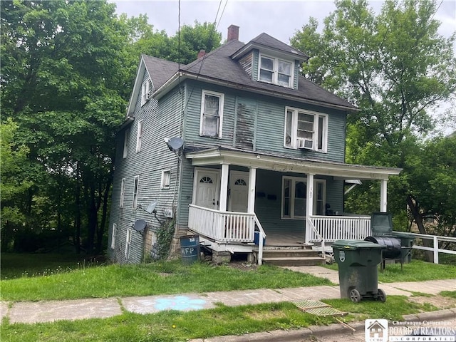 163 Barrows St, Jamestown, NY 14701 - american foursquare style home with a porch and a chimney