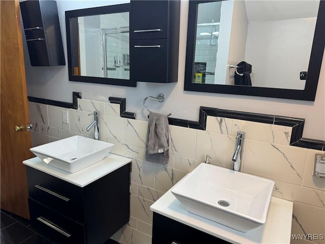 251 Minnesota Ave, Buffalo, NY 14215 - full bath featuring a stall shower, backsplash, tile walls, and vanity
