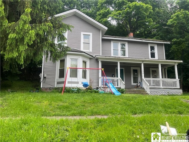 124 Barrows, Jamestown, NY 14701 - view of front of house featuring a porch, a chimney, and a front yard