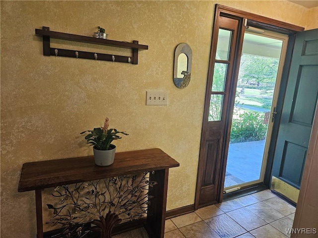 7066 E Ln, Boston, NY 14057 - foyer entrance with light tile patterned floors and baseboards