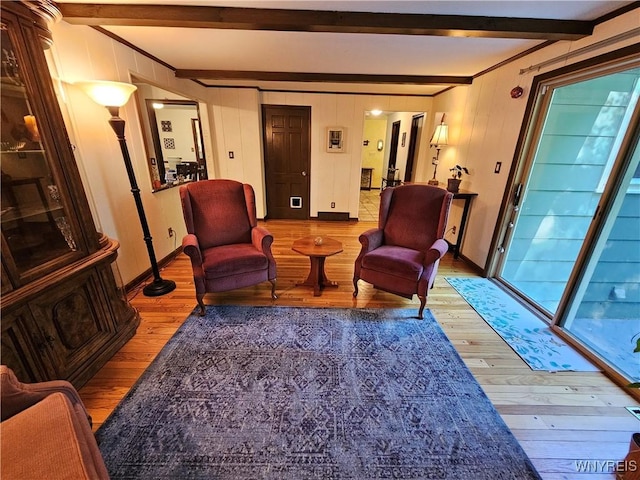 7066 E Ln, Boston, NY 14057 - sitting room with wood finished floors, beamed ceiling, and baseboards
