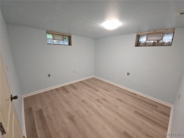7066 E Ln, Boston, NY 14057 - below grade area featuring light wood-type flooring and baseboards