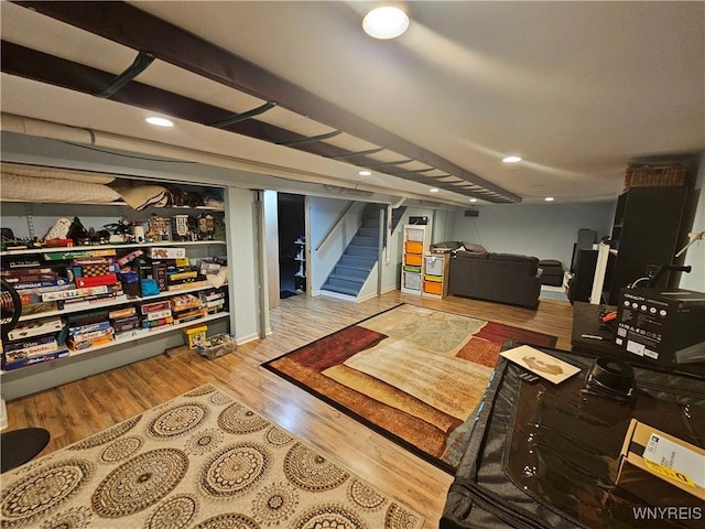 7066 E Ln, Boston, NY 14057 - finished basement featuring stairs, wood finished floors, and recessed lighting