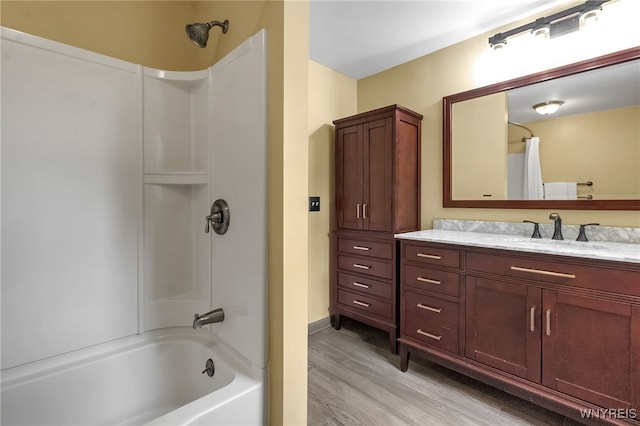 7066 E Ln, Boston, NY 14057 - bathroom with vanity, wood finished floors, and shower / tub combo