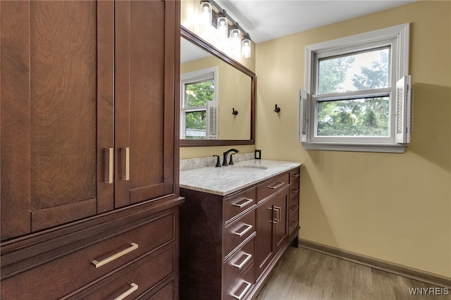7066 E Ln, Boston, NY 14057 - bathroom featuring wood finished floors and vanity