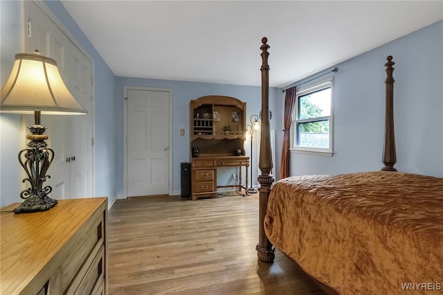 7066 E Ln, Boston, NY 14057 - bedroom with light wood-style floors and baseboards