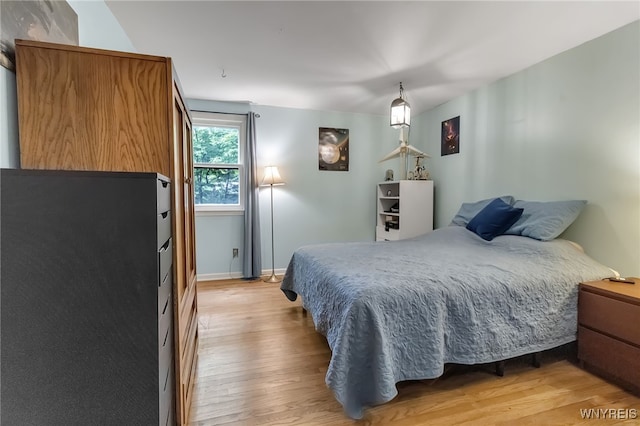 7066 E Ln, Boston, NY 14057 - bedroom featuring light wood finished floors and baseboards