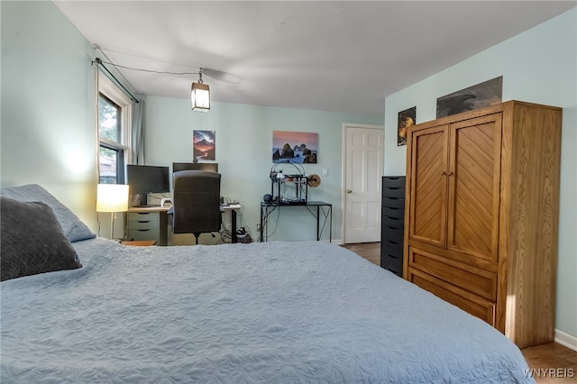 7066 E Ln, Boston, NY 14057 - bedroom with wood finished floors and baseboards