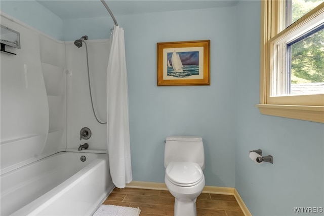 7066 E Ln, Boston, NY 14057 - bathroom featuring shower / tub combo with curtain and wood tiled floors