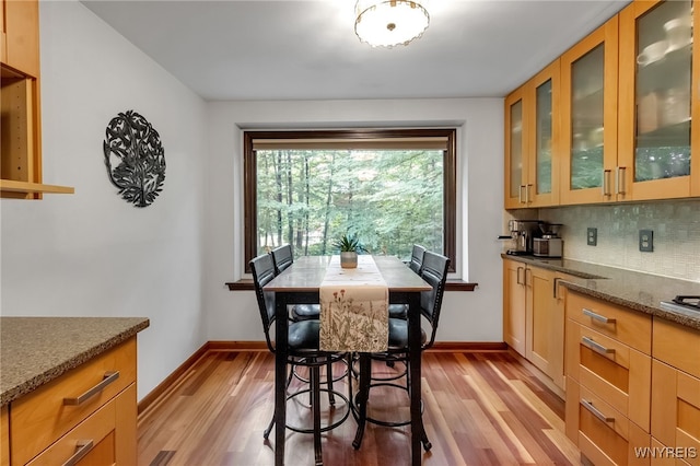 7066 E Ln, Boston, NY 14057 - dining area with light wood finished floors and baseboards