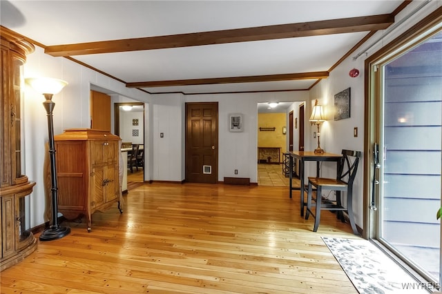 7066 E Ln, Boston, NY 14057 - living area with beam ceiling, crown molding, and light wood-type flooring