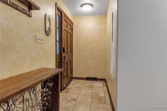 7066 E Ln, Boston, NY 14057 - entryway featuring a textured wall and light tile patterned floors