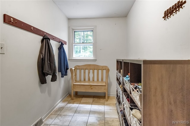 7066 E Ln, Boston, NY 14057 - bedroom with light tile patterned floors and baseboards