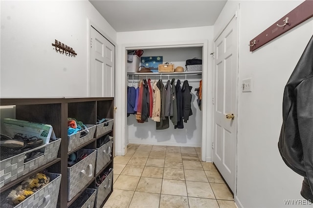 7066 E Ln, Boston, NY 14057 - walk in closet with light tile patterned floors