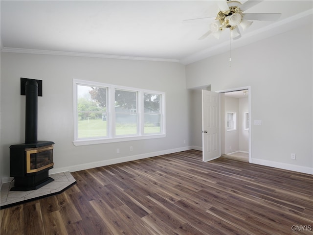 1120 Temple St, Watertown-City, NY 13601 - unfurnished living room featuring wood finished floors, a ceiling fan, a wood stove, vaulted ceiling, and crown molding