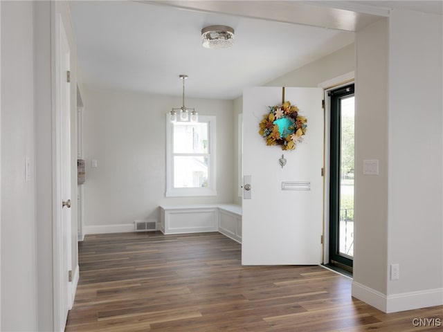1120 Temple St, Watertown-City, NY 13601 - entrance foyer featuring dark wood finished floors and baseboards