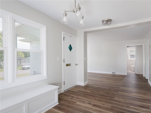 1120 Temple St, Watertown-City, NY 13601 - mudroom with dark wood finished floors and baseboards