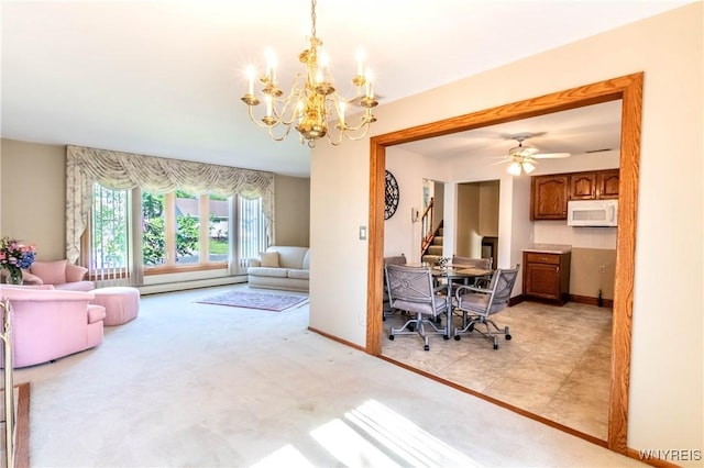 291 Everett Pl, Tonawanda-Town, NY 14150 - living room with stairway, a chandelier, baseboards, and light carpet