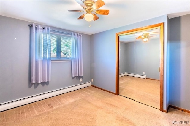 291 Everett Pl, Tonawanda-Town, NY 14150 - unfurnished bedroom with a baseboard heating unit, carpet flooring, baseboards, and a closet
