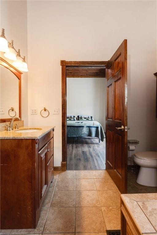 676 County Road 64, Big Flats, NY 14903 - bathroom featuring vanity and tile patterned flooring