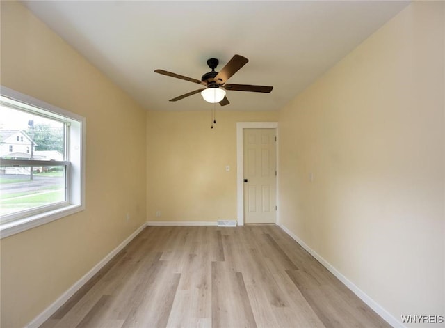 70 Minard St, Lockport-City, NY 14094 - spare room with light wood finished floors, ceiling fan, and baseboards