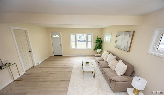 70 Minard St, Lockport-City, NY 14094 - living area with light wood-style flooring, recessed lighting, and baseboards