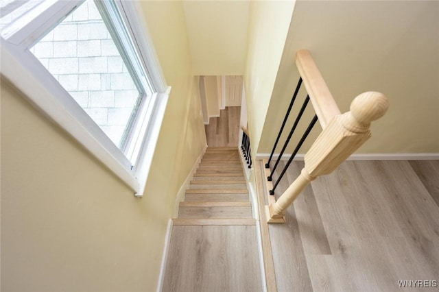 70 Minard St, Lockport-City, NY 14094 - stairs featuring wood finished floors and baseboards