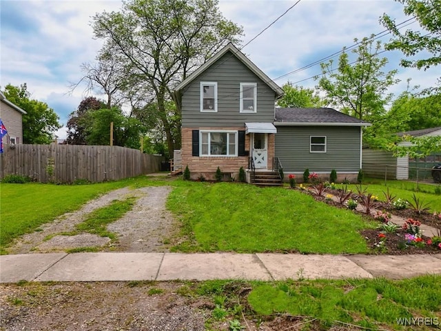 70 Minard St, Lockport-City, NY 14094 - traditional home with entry steps and a shingled roof