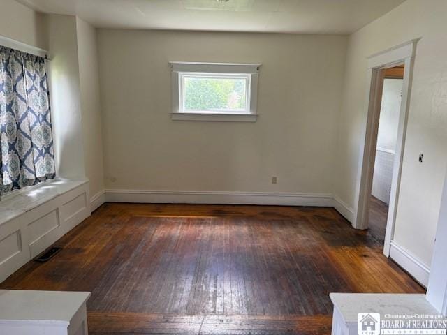 154 Falconer St, Jamestown, NY 14701 - empty room with hardwood / wood-style floors and baseboards
