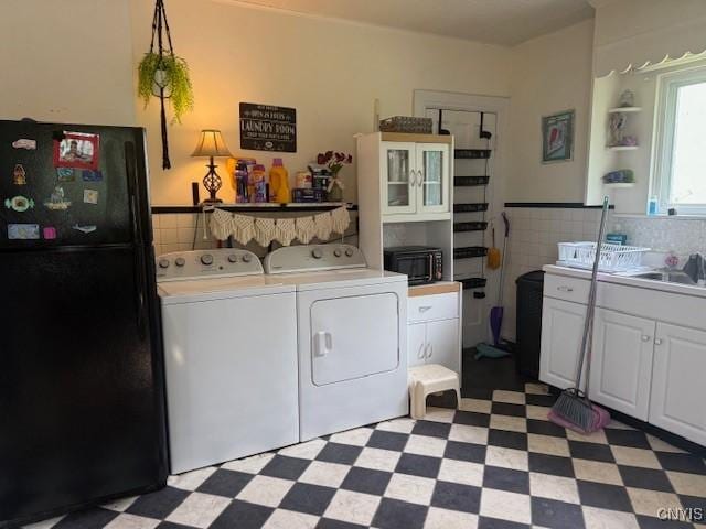 322 Eastern Ave, Herkimer, NY 13350 - washroom with washer and dryer, light floors, and a sink