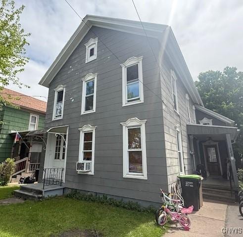 322 Eastern Ave, Herkimer, NY 13350 - rear view of house featuring a yard