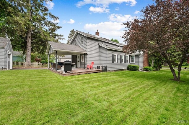 408 Elm St, Manlius, NY 13066 - back of property featuring a deck and a chimney
