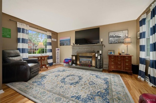 408 Elm St, Manlius, NY 13066 - living area featuring a fireplace and wood finished floors