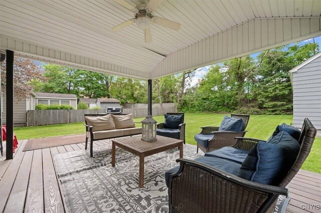 408 Elm St, Manlius, NY 13066 - wooden deck with an outdoor hangout area, a ceiling fan, and view of scattered trees