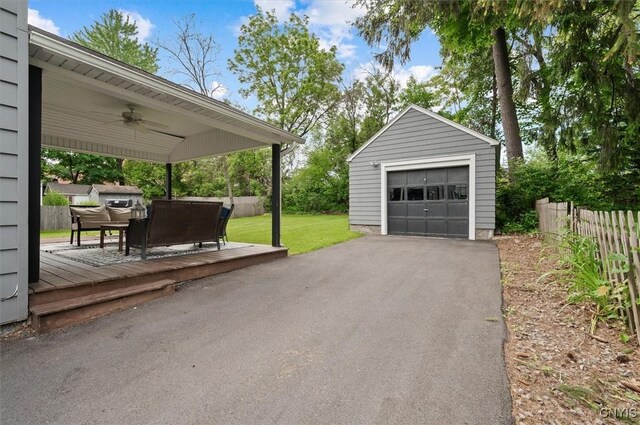 408 Elm St, Manlius, NY 13066 - detached garage with ceiling fan and asphalt driveway