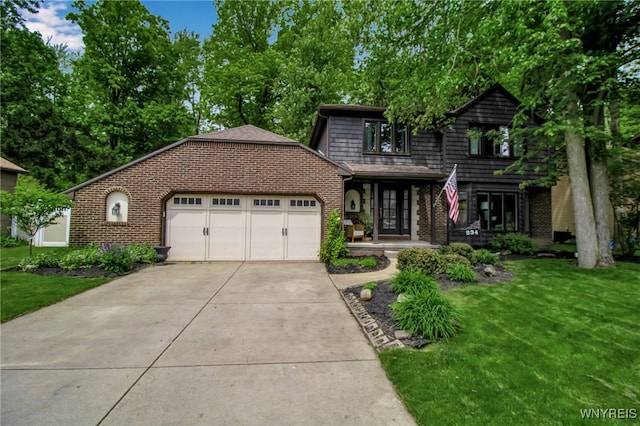 234 Misty Ln, Amherst, NY 14051 - view of front facade with brick siding, a garage, concrete driveway, and a front lawn